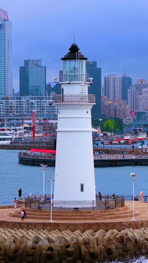 Qingdao's Iconic Lighthouse Overlooking Bustling Olympic Sailing Center Stock Footage 330849024