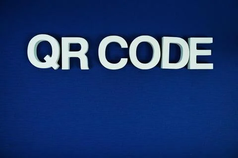 QR Code alphabet letters with space for text top view  on navy blue Stock Photos