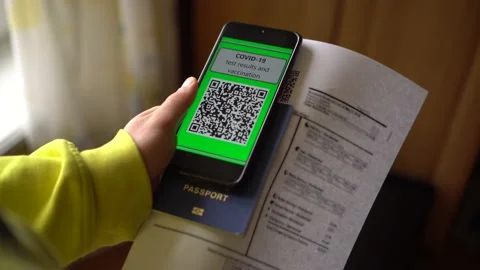 QR code app during Coronavirus pandemic. COVID-19 Test Results on the smartphone Stock Footage 149545649