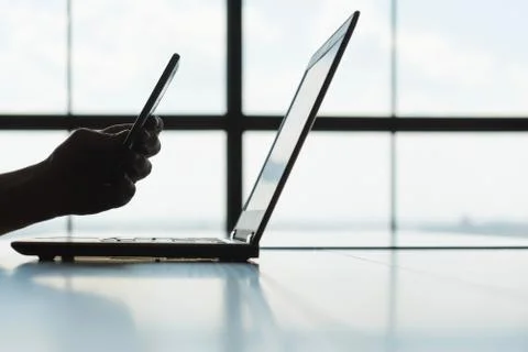 Qr code authorization man scan laptop screen phone Stock Photos