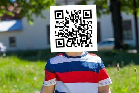Qr code on the child's face Stock Photos