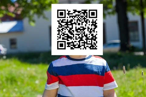 Qr code on the child's face Stock Photos