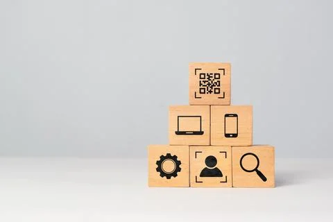 QR code concept with matrix barcode displayed on wooden blocks. Digital mar.. Фото