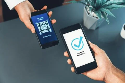 QR code is displayed on screen for cashless payment scanning. Fervent Foto stock