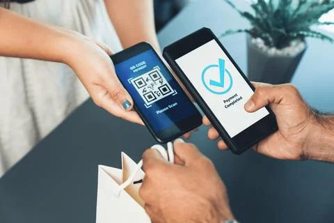 QR code is displayed on screen for cashless payment scanning. Fervent Foto stock