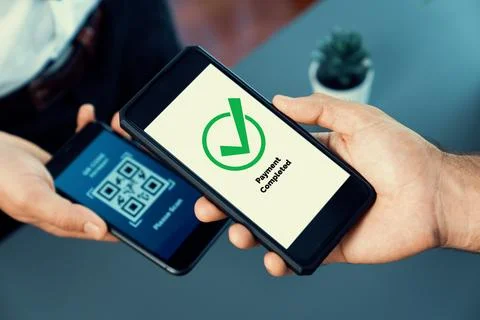 QR code is displayed on screen for cashless payment scanning. Fervent Foto stock