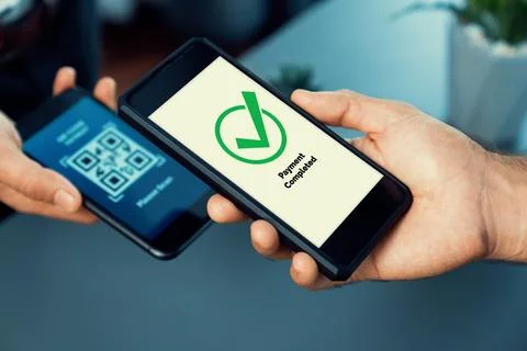 QR code is displayed on screen for cashless payment scanning. Fervent 写真素材