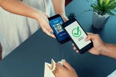 QR code is displayed on screen for cashless payment scanning. Fervent 스톡 사진
