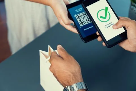 QR code is displayed on screen for cashless payment scanning. Fervent Stock Photos