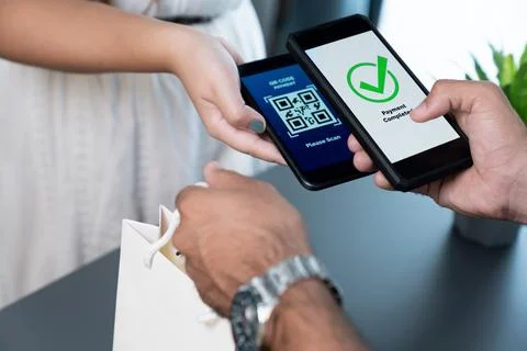 QR code is displayed on screen for cashless payment scanning. Fervent Foto stock