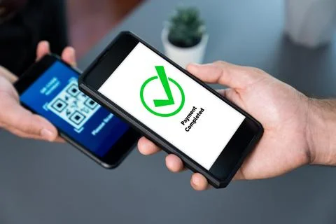 QR code is displayed on screen for cashless payment scanning. Fervent Foto stock