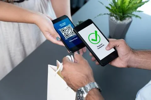 QR code is displayed on screen for cashless payment scanning. Fervent 스톡 사진