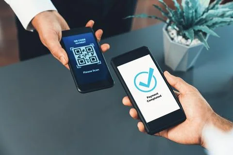 QR code is displayed on screen for cashless payment scanning. Fervent Foto stock