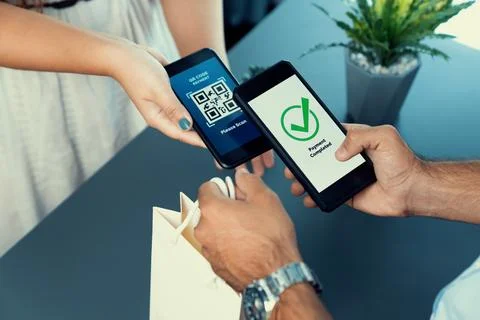 QR code is displayed on screen for cashless payment scanning. Fervent Foto stock