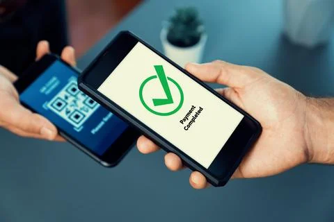 QR code is displayed on screen for cashless payment scanning. Fervent Foto stock