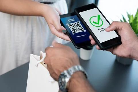 QR code is displayed on screen for cashless payment scanning. Fervent Stockfoto's