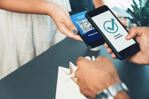 QR code is displayed on screen for cashless payment scanning. Fervent Foto stock