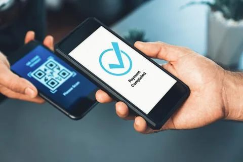 QR code is displayed on screen for cashless payment scanning. Fervent Foto stock