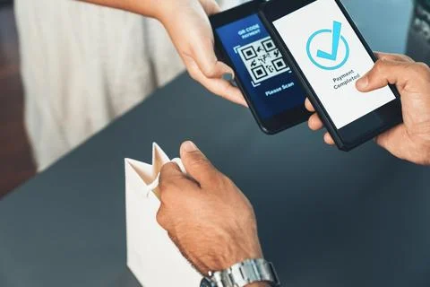 QR code is displayed on screen for cashless payment scanning. Fervent Foto stock