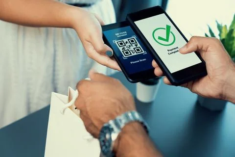 QR code is displayed on screen for cashless payment scanning. Fervent Foto stock
