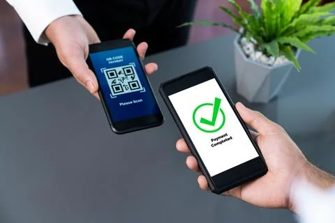 QR code is displayed on screen for cashless payment scanning. Fervent 写真素材