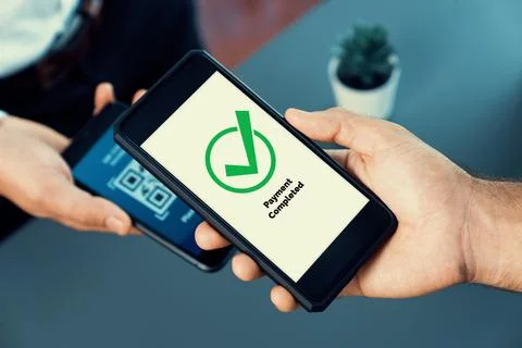 QR code is displayed on screen for cashless payment scanning. Fervent Stock Photos