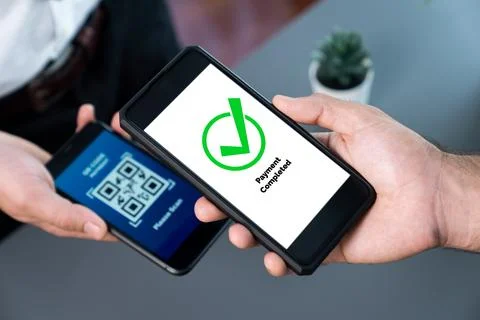 QR code is displayed on screen for cashless payment scanning. Fervent Foto stock