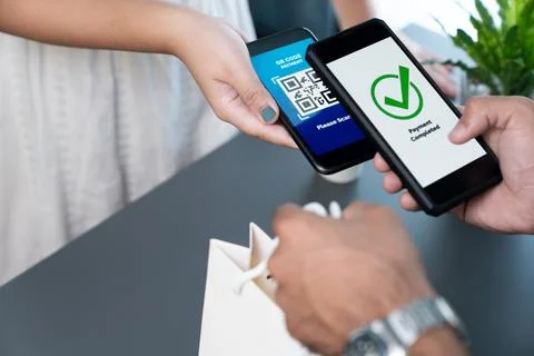 QR code is displayed on screen for cashless payment scanning. Fervent 스톡 사진