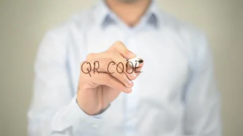 QR Code , man writing on transparent screen Foto stock