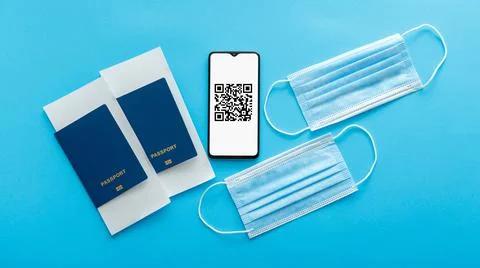 Qr code of negative covid PCR test vaccination stamp on smartphone screen. Green Stock Photos