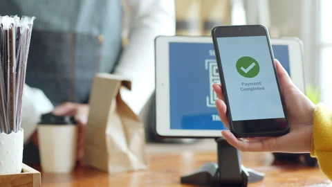 QR code payment, customer using smartphone for paying at shop Stock Footage 196902310