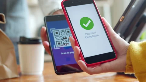 QR code payment, customer using smartphone for paying at shop Stock Footage 196902430