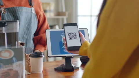 QR code payment, customer using smartphone for paying at shop Stock Footage 196902594