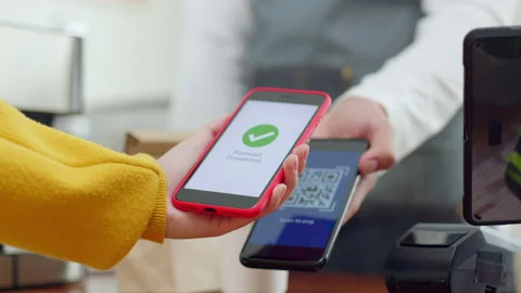 QR code payment, customer using smartphone for paying at shop Stock Footage 196902722