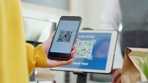 QR code payment, customer using smartphone for paying at shop Stock Footage 196902728