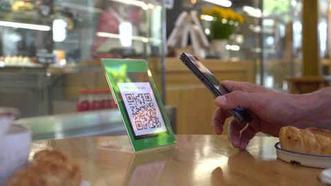 QR code payment in the restaurant. Scanning a QR code from a mobile app Video stock 146679581