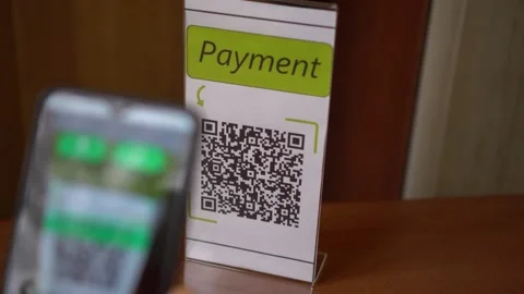 QR Code Payment using a smartphone. Mobile payments using QR code scanning app Stock Footage 147110835