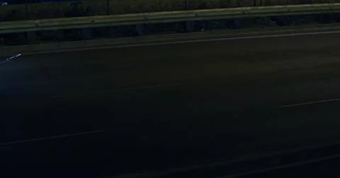 QR code scanner against light trails on black background Stock Illustration