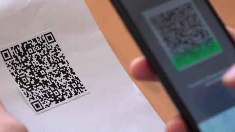 QR Code Scanner on the Smartphone close up. Data on Covid-19 and vaccination. QR Stock Footage 167053672