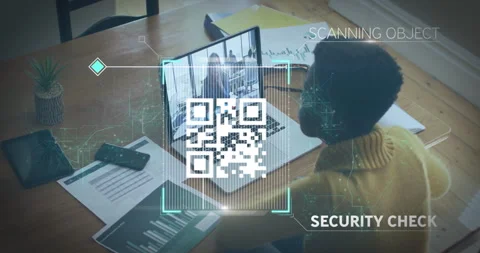 QR code scanning animation over person working at desk with laptop Stock Footage 306244015