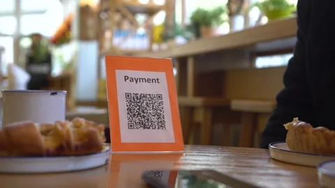 QR code touch-free payment display in the retail store. QR code payment Stock Footage 152235718