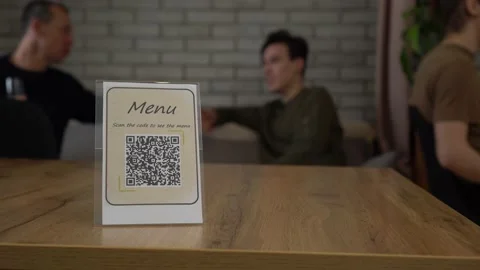 QR display with contactless digital menu on the table in the restaurant or bar Stock Footage 148188571