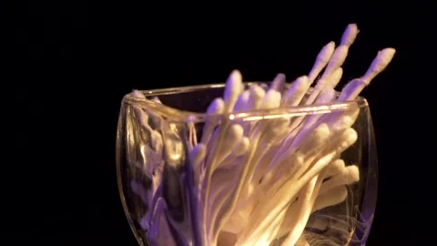 Qtips spiining on table Stock Footage 144242656