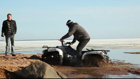 Quad bike is stuck in the mud Stock Footage 3876136