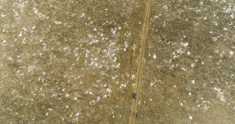 Quad bikes Driving on an Empty Field Stock Footage 98153543
