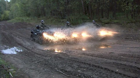 Quad bikes on forest road Stock Footage 33635845