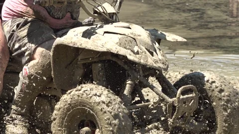 Quad biking on muddy terrain 動画素材 333456913