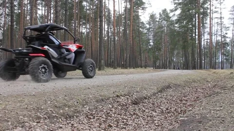 Quad biking in the woods Stock Footage 152990855