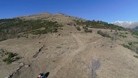Quad climbing up the mountain Stock Footage 100678318