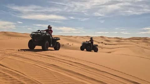 Quad in the dunes of the sahara Stock Footage 255723051